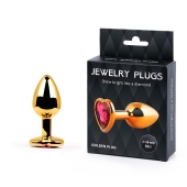 Золотистая анальная пробка с малиновым кристаллом-сердечком - 7 см. - Anal Jewelry Plug - купить с доставкой в Орске